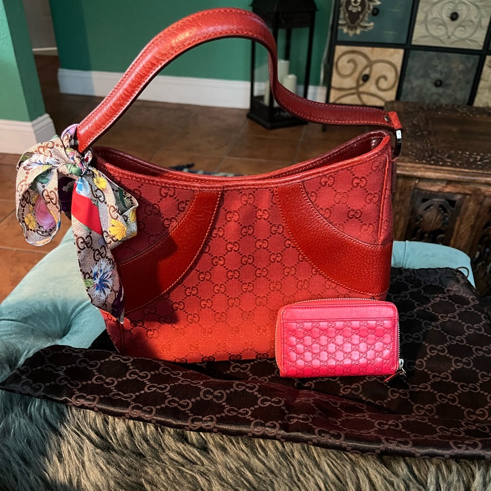 Gucci purse with matching wallet and scarf.